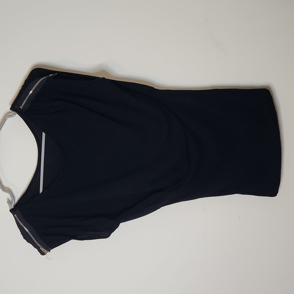 Black blouse top. Flowy top slim fitting waist. Size small
